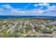 Aerial view showcasing a waterfront community at 140 Meadowlark Dr, Safety Harbor, FL 34695