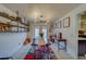 Modern farmhouse dining room with industrial shelving and a unique chandelier at 140 Meadowlark Dr, Safety Harbor, FL 34695