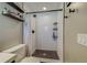 Clean bathroom with white subway tile and dark hexagon floor at 140 Meadowlark Dr, Safety Harbor, FL 34695