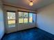 Sunroom with tiled floors and access to the backyard at 1504 Mission Hills Blvd # 19C, Clearwater, FL 33759
