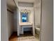 Bathroom with single sink vanity and access to a toilet and shower at 1504 Mission Hills Blvd # 19C, Clearwater, FL 33759