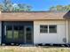 Exterior view of a house with a dark and light colored siding at 1504 Mission Hills Blvd # 19C, Clearwater, FL 33759
