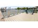 Private dock with seating and ladder access to water at 2599 W Bay Isle Se Dr, St Petersburg, FL 33705