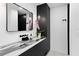 Modern bathroom with black and white marble vanity at 2599 W Bay Isle Se Dr, St Petersburg, FL 33705