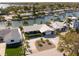 Aerial view of waterfront home with dock and spacious backyard at 2599 W Bay Isle Se Dr, St Petersburg, FL 33705
