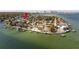 Aerial view of waterfront home and neighborhood at 2599 W Bay Isle Se Dr, St Petersburg, FL 33705