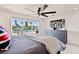 Spacious bedroom with water views, king bed, and modern dresser at 2599 W Bay Isle Se Dr, St Petersburg, FL 33705