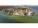 Aerial view of waterfront home and neighborhood at 2599 W Bay Isle Se Dr, St Petersburg, FL 33705