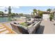 Waterfront patio with firepit and comfortable seating at 2599 W Bay Isle Se Dr, St Petersburg, FL 33705