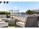 Relaxing patio with firepit and view of the water at 2599 W Bay Isle Se Dr, St Petersburg, FL 33705