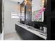 Modern bathroom with double vanity and marble countertops at 2599 W Bay Isle Se Dr, St Petersburg, FL 33705