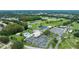 Aerial view of community amenities including pool, tennis courts, and parking at 3361 Scorecard Dr # 0, New Port Richey, FL 34655