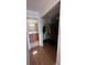 Clean bathroom with wood cabinets and tile floor at 6060 Shore S Blvd # 705, Gulfport, FL 33707