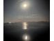 Night view of the water with a full moon at 6060 Shore S Blvd # 705, Gulfport, FL 33707