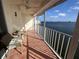 Serene balcony with comfortable seating and views of the sea, creating a peaceful outdoor retreat at 6060 Shore S Blvd # 705, Gulfport, FL 33707