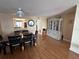 Dining area featuring a wood table, with access to the kitchen, blending comfort and functionality for modern living at 6060 Shore S Blvd # 705, Gulfport, FL 33707