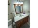 Bathroom with vanity, mirror, and toilet at 6060 Shore S Blvd # 705, Gulfport, FL 33707