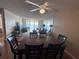 Spacious living room with water views, comfortable seating, and a large mirror enhancing the natural light at 6060 Shore S Blvd # 705, Gulfport, FL 33707