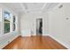 Simple dining room with hardwood floors and kitchen access at 1045 17Th N Ave, St Petersburg, FL 33704