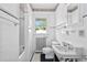 Classic white bathroom with subway tile and vintage fixtures at 1045 17Th N Ave, St Petersburg, FL 33704