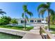 Backyard oasis with private pool, canal access, and spacious patio at 17161 2Nd St E, North Redington Beach, FL 33708