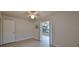 Bedroom with light wood floors and access to a sunroom at 1728 Council Dr, Sun City Center, FL 33573