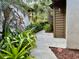 Landscaped walkway leading to a shed at 2004 Westley Ct, Safety Harbor, FL 34695