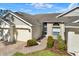 Front view of home with walkway and landscaping at 2403 Nantucket Green Ct # 0, Sun City Center, FL 33573