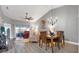 Dining area with wood table and chandelier at 2403 Nantucket Green Ct # 0, Sun City Center, FL 33573