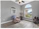 Cozy office space with a comfortable armchair and large window at 2403 Nantucket Green Ct # 0, Sun City Center, FL 33573
