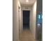 Bright hallway with light tile flooring at 2452 Nantucket Ter, North Port, FL 34286