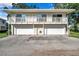 Two-story building with private balconies and garages at 2937 Bough Ave # D, Clearwater, FL 33760