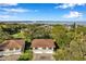 Aerial view of a waterfront community with houses and bridges at 2937 Bough Ave # D, Clearwater, FL 33760