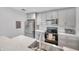Updated kitchen with stainless steel appliances and gray cabinets at 2937 Bough Ave # D, Clearwater, FL 33760