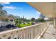 Balcony view of the community pool and parking lot at 2937 Bough Ave # D, Clearwater, FL 33760