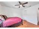 Bedroom with a double bed, ceiling fan, and closet at 2937 Bough Ave # D, Clearwater, FL 33760