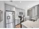 Updated kitchen with stainless steel appliances and gray cabinets at 2937 Bough Ave # D, Clearwater, FL 33760