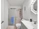 Clean bathroom with a shower/tub combo, vanity, and a large mirror at 2937 Bough Ave # D, Clearwater, FL 33760