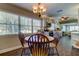 Kitchen and dining area with hardwood floors and a view at 300 Pinellas S Way, St Petersburg, FL 33707