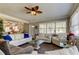 Spacious living room featuring hardwood floors, neutral colors, and ample natural light at 300 Pinellas S Way, St Petersburg, FL 33707