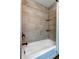 Clean bathroom with a shower/tub combo at 300 Pinellas S Way, St Petersburg, FL 33707