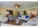 Open concept living room with a view into the kitchen at 300 Pinellas S Way, St Petersburg, FL 33707
