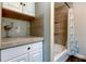 Updated bathroom with a tub shower combination at 300 Pinellas S Way, St Petersburg, FL 33707