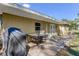 Enjoy grilling and dining on this spacious back patio with plenty of seating at 300 Pinellas S Way, St Petersburg, FL 33707