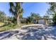 Ranch style home with attached garage at 300 Pinellas S Way, St Petersburg, FL 33707