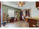 Bright home office features built-in shelving and wood desk at 300 Pinellas S Way, St Petersburg, FL 33707