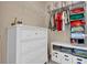 Organized closet with hanging rods, shelves, and drawers, providing great storage at 30684 Penny Surf Loop, Wesley Chapel, FL 33545