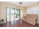 Relaxing sunroom with balcony access and comfortable seating at 315 30Th W Ave # B201, Bradenton, FL 34205