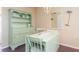 Charming dining area with light green table and hutch at 315 30Th W Ave # B201, Bradenton, FL 34205