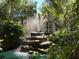 Community fountain with lush landscaping at 315 30Th W Ave # B201, Bradenton, FL 34205